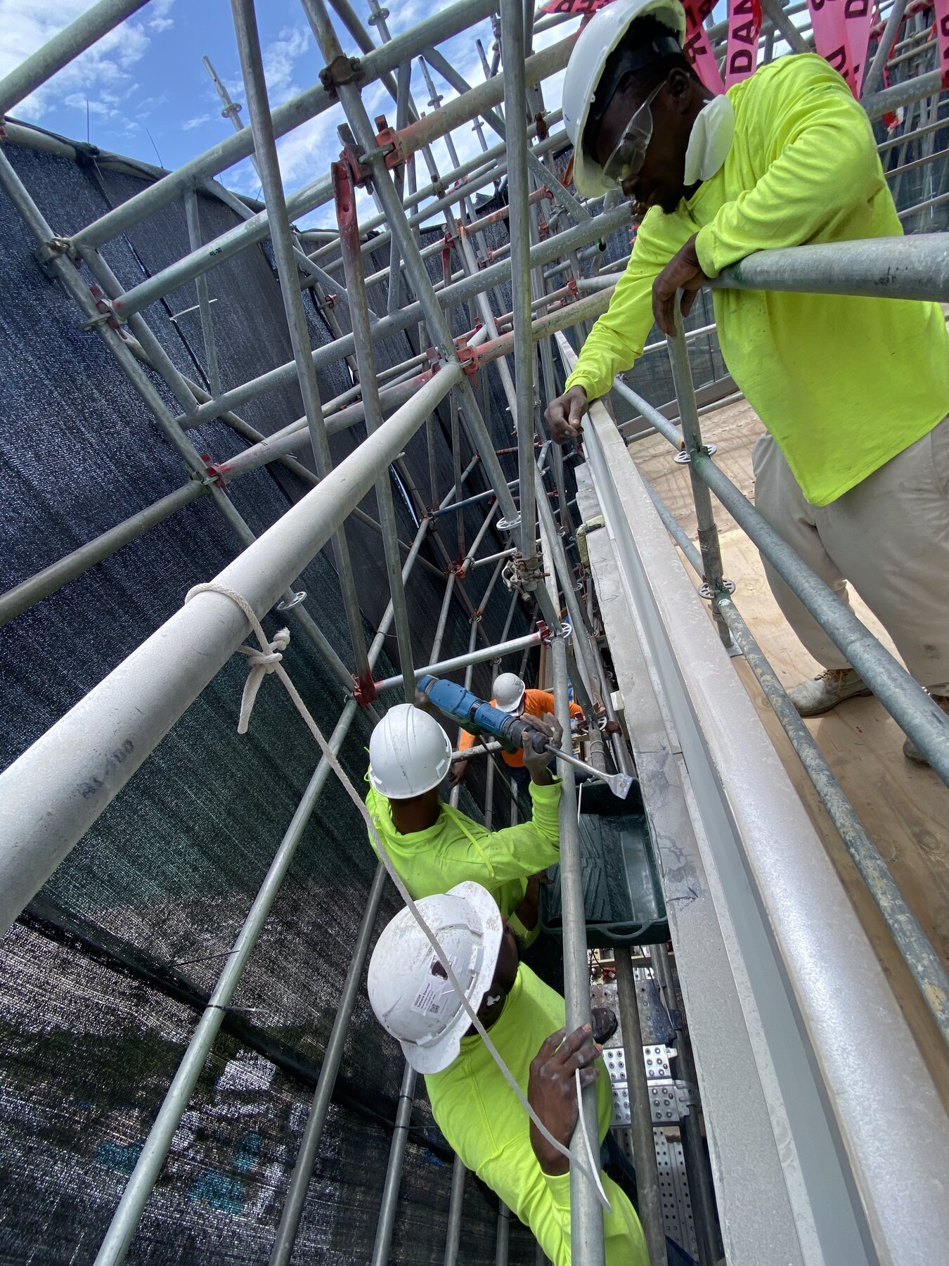Black Bridge crew performing restoration work on scaffolding